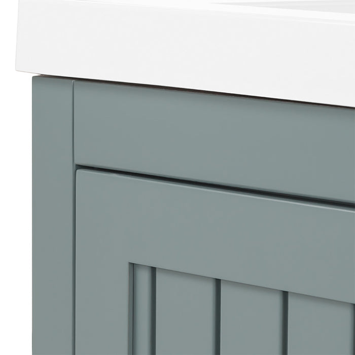 Corner closeup of 60.5 in Chamiree sage bathroom vanity with cabinet, 6 drawers, satin nickel hardware, white sink top