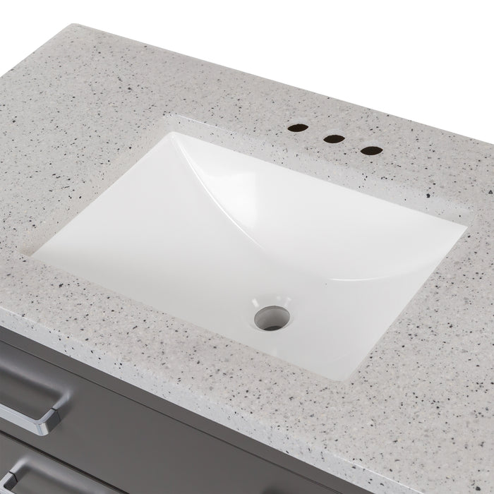 Predrilled silver ash granite-look sink top on 36.5 inch Alda gray bathroom vanity with silver ash granite-look top, polished chrome handles, 2 drawers, open shelf, adjustable legs