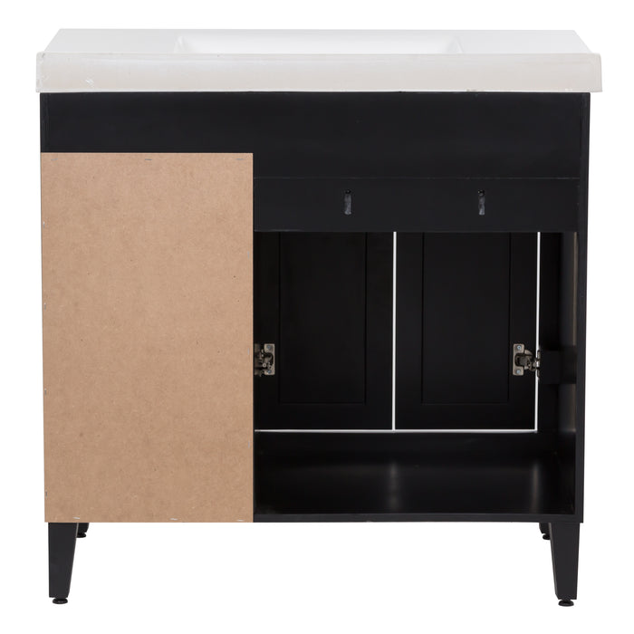 View of the open-back design of the Beckett 37" wide powder room vanity in black, which allows for quick installation around your existing plumbing