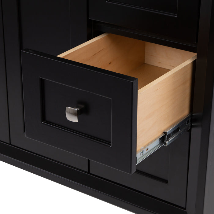 Up close view of extended middle drawer of the Beckett 49" wide furniture-style bathroom vanity with black cabinet finish and fine grain nickel pull