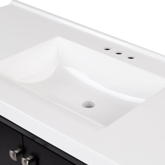 View of the white, predrilled sink top of Beckett 49" wide furniture-style bathroom vanity with black cabinet finish