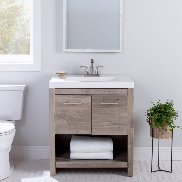 Birney 30.5" W Freestanding Bathroom Vanity with 2-door, open shelf, sink top installed in bathroom with faucet, toilet, mirror, window