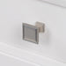 Close-up of the satin nickel pull on the soft-close drawers of the Bolivar 61" wide double-sink dresser-style vanity which features a traditional design with 6 inset, recessed-panel cabinet drawers soft off-white finish