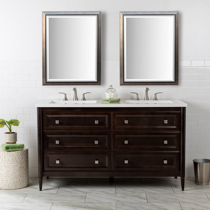 Front view of the Bolivar 61" double-sink dresser-style vanity which features a traditional design with 6 inset, recessed-panel cabinet drawers in a rich brown finish. Shown here with mirrors, hand towel and other bathroom items.
