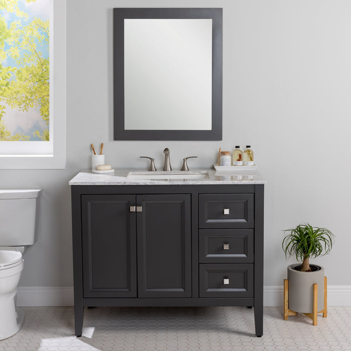 Cartland 43-in gray bathroom vanity with 2-door cabinet, 3 drawers, garnite-look sink top installed in bathroom with faucet and mirror