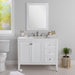 Cartland 43-in white bathroom vanity with 2-door cabinet, 3 drawers, garnite-look sink top installed in bathroom with faucet and mirror
