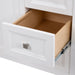 Open drawer on Cartland 37 in white bathroom vanity with cabinet, 3 drawers, sink top