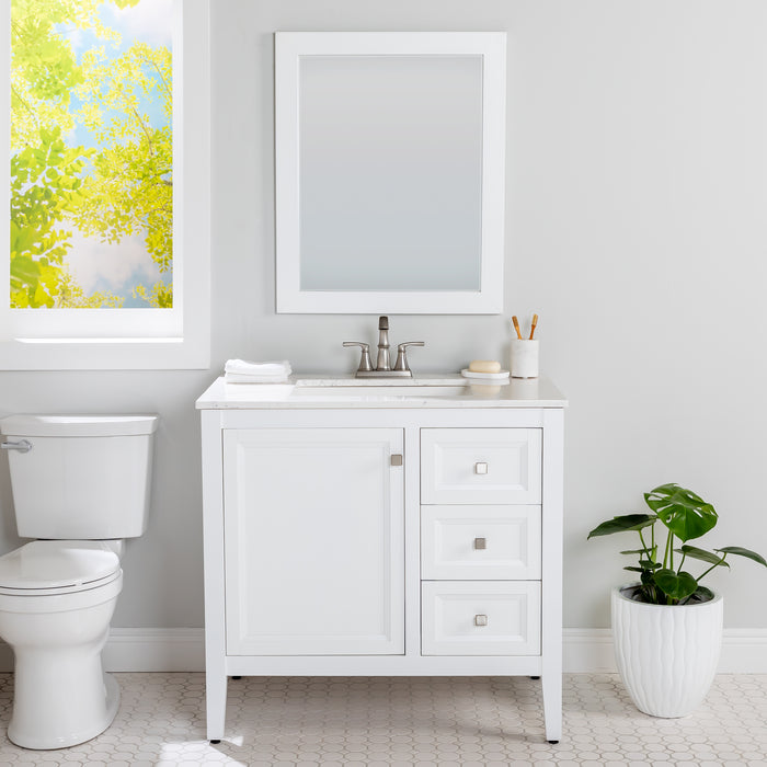 Cartland 37 in white bathroom vanity with cabinet, 3 drawers, sink top installed in bathroom with faucet, mirror