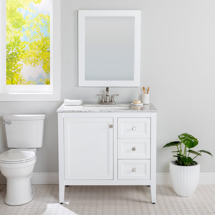 Cartland 37 in white bathroom vanity with cabinet, 3 drawers, sink top installed in bathroom with faucet and mirror