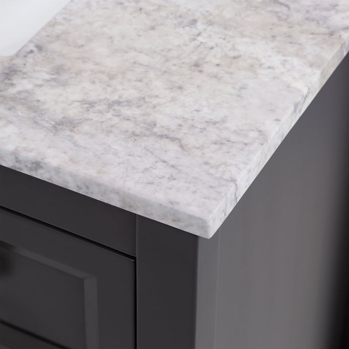 Closeup of ganite-look countertop on Cartland 37 in gray bathroom vanity with cabinet, 3 drawers, sink top