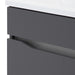 Side closeup of Brennan gray 18 inch hardware-free compact bathroom vanity with 1 door and white sink top