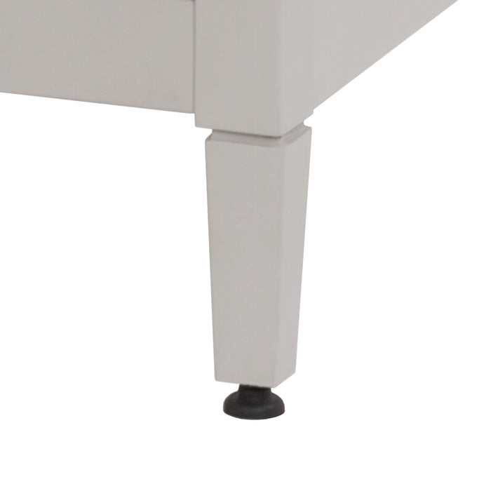 Leg with leveling foot on Tilford gray furniture-style bathroom vanity with 1-door cabinet, 3 drawers, white sink top