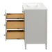 Side view of Tilford gray furniture-style bathroom vanity with 1-door cabinet, 3 open drawers, white sink top 