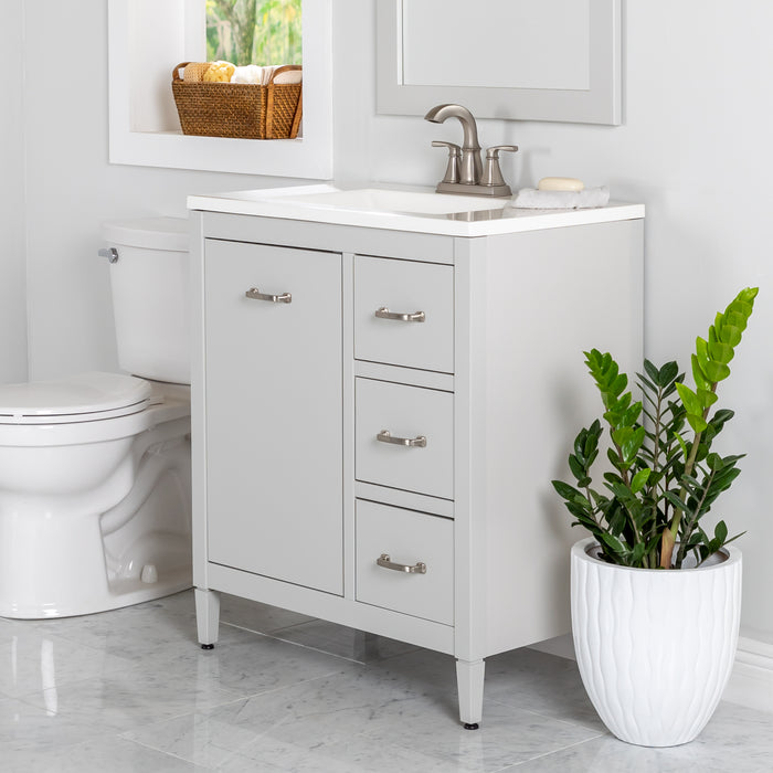 Tilford gray furniture-style bathroom vanity with 1-door cabinet, 3 drawers, white sink top installed in bathroom with faucet and mirror