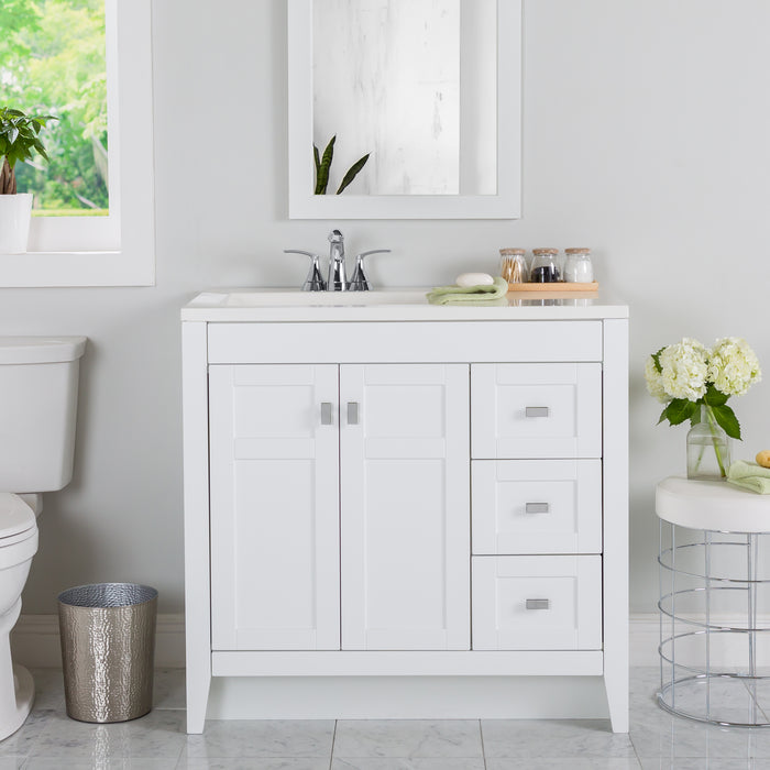 Lonsdale 36 inch white powder room vanity with 2 doors, 3 drawers, and white top with offset sink installed in bathroom