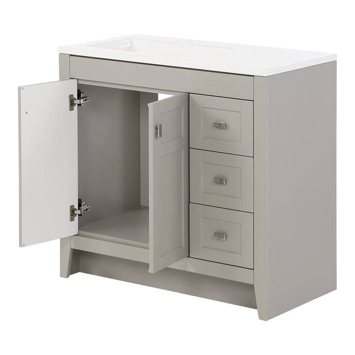 Open doors on Lonsdale 36 inch warm gray powder room vanity with 2 doors, 3 drawers, and white top with offset sink