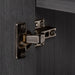 Adjustable hinge on Trente 60 inch 4-door, 5-drawer, hardware-free double-sink bathroom vanity with woodgrain finish and white sink