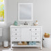 Elvet 49 in white bathroom vanity with 6 drawers, cabinet, open shelf, white vanity top installed in bathroom with faucet & mirror