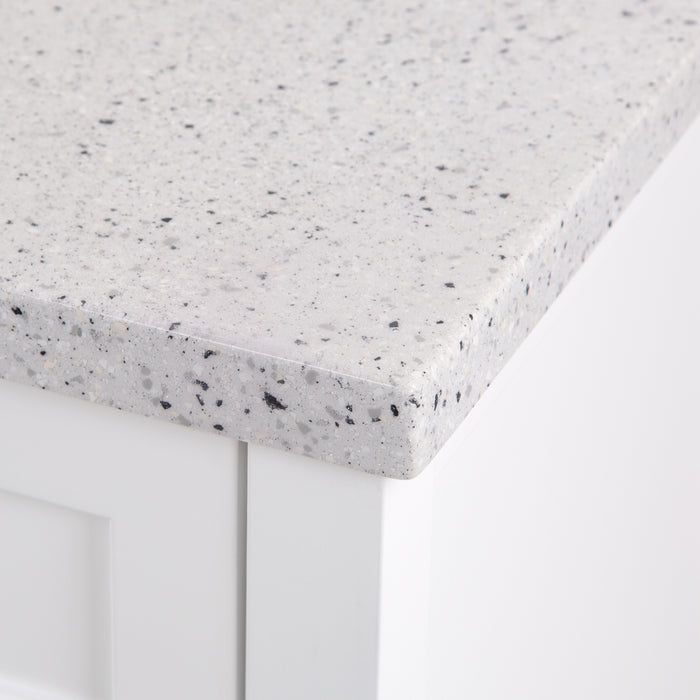 Closeup of silver ash counter on Elvet 49 in white bathroom vanity with 6 drawers, cabinet, open shelf, granite-look sink top