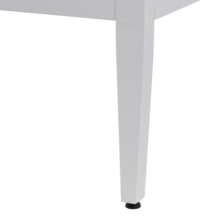 Closeup of leg and leveling foot on Fordwin 43 in furniture-style white vanity with granite-look sink top, 6 drawers, cabinet