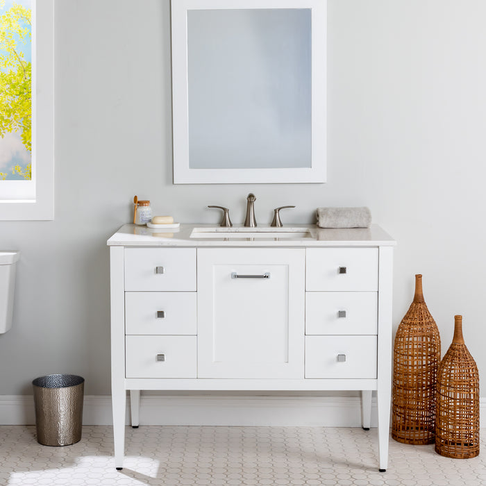 Fordwin 43 in furniture-style white vanity with granite-look sink top, 6 drawers, cabinet installed in bathroom with faucet and mirror