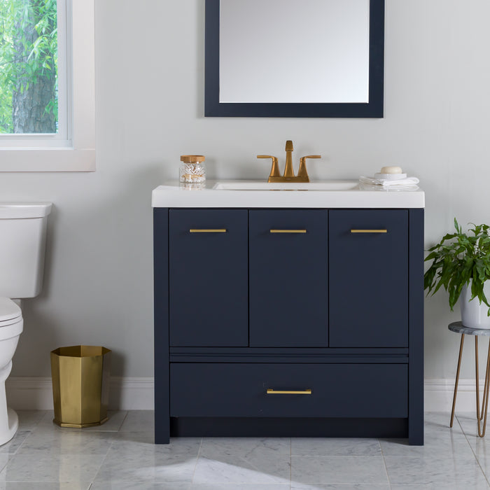 Hali 36.5 blue bathroom vanity with 3 doors, 2 drawers, brushed gold hardware, white sink top installed in batroom with faucet and mirror