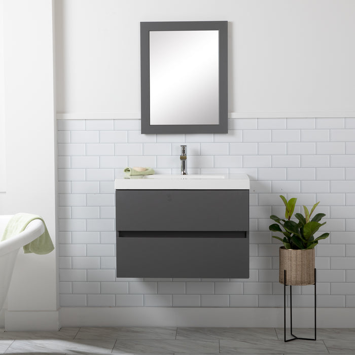 Innes 30.5" W gray floating bathroom vanity installed in bathroom with mirror and plant