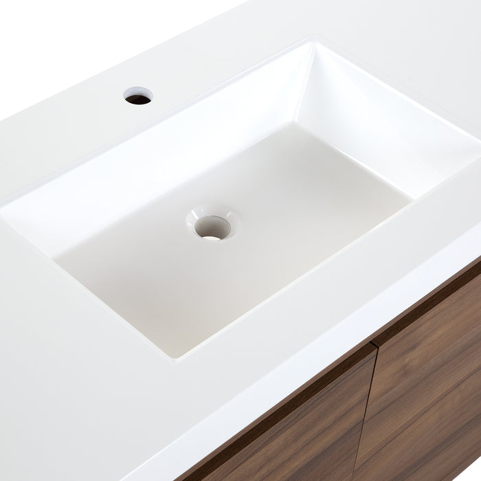 Predrilled white cultured marble sink top with integrated rectangular sink on Kelby vanity with woodgrain finish