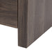 Toekick closeup of Nixie 18.5" wide woodgrain bathroom vanity with 1 door, 1 drawer, 2 black handles, white sink top