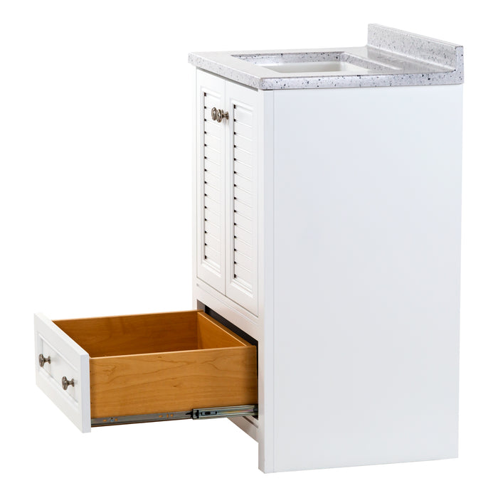 Open bottom drawer on White bathroom vanity with louvered doors, stone-look top, bottom drawer