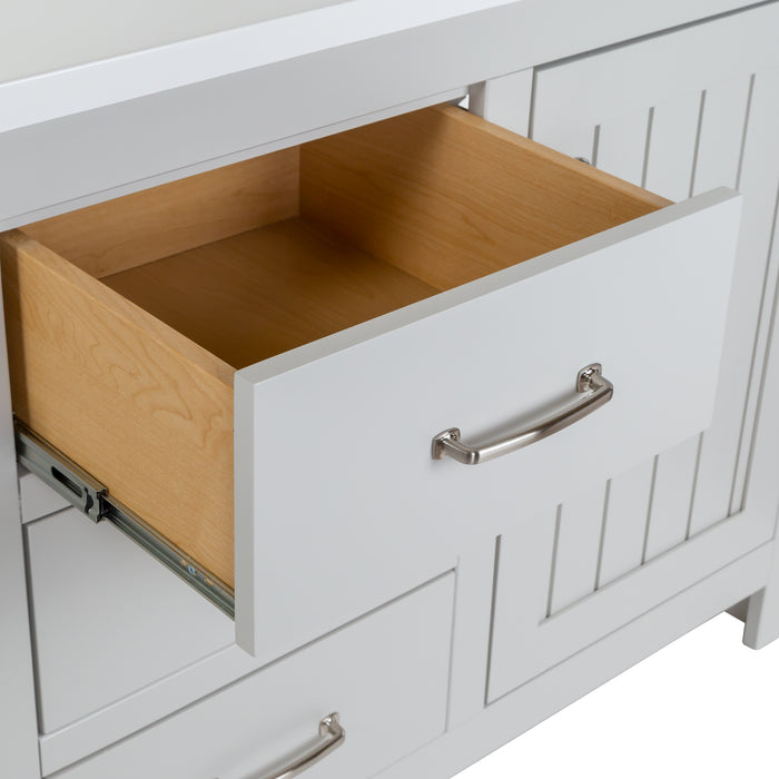 Open drawer on 61 in. Rhiya gray double-sink bathroom vanity with 3 drawers, 2 cabinets, satin nickel hardware, white sink top