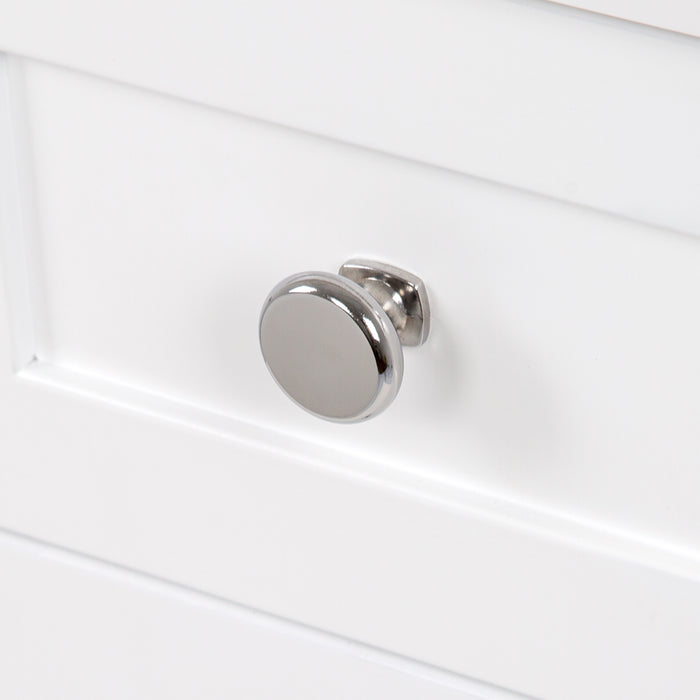 Polished chrome drawer pull on Sykes 31 in white bathroom vanity with 2 drawers, open shelf, cabinet, and white sink top